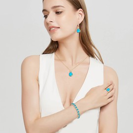 Ever Faith 4-Piece Drop Cubic Zirconia Jewellery Set, Glamour Pendant Necklace, Earrings, Tennis Bracelet and Open Ring Set for Women, Wedding Party, Clear Silver Tone, Cubic Zirconia