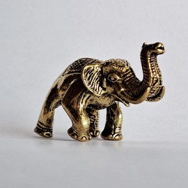 Thai Sawasdee Brass Smiling Elephant Miniature Figurines, Size 1.5 x 0.7 x 1.0 cm., for Home, Office, and Souvenir Gifts. They symbolize Power and Riches.