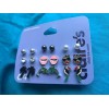 Claire’s Nine pairs of Claire’s pierced Earrings Parrots Dolphins Palm