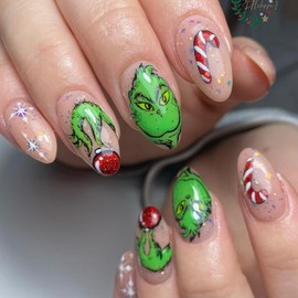 Christmas Press on Nails Medium Almond Fake Nails Winter Green Monster Snowflake False Nails with Xmas Candy Cane Designs Full Cover Acrylic Nails Glitter Christmas Stick on Nails for Women 24 Pcs