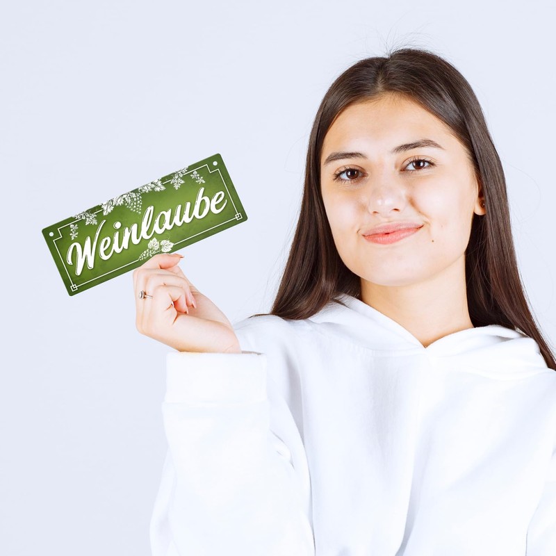 Wine Metal Sign with Vines Motif and Saying "Weinlaube -