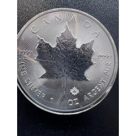 Royal Canadian Mint Random year CANADA Maple Leaf 1oz FINE SILVER .9999 in a coin flip