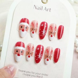 24Pcs Christmas Press on Nails Red Cat Eye Medium Almond Fake Nails with Santa Claus Design Elk Glue on Nail Snowflakes False Nail Press ons Reusable Christmas Nails for Women Girls Manicure