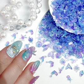 Mkwntg 100Pcs Ocean Series Nails Charms 3D Blue Seashell Starfish Nail Rhinestones Resin Dolphin Mermaid Flat Nail Art Supplies for Acrylic Nails Glow in Night Nail Charms for Women Summer DIY