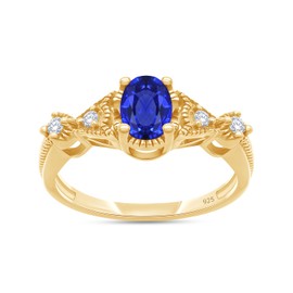 AFFY Oval Cut Simulated Blue Sapphire & Cubic Zirconia Fashion Ring in 14k Yellow Gold Over Sterling Silver Ring Size - 7