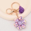 BAOSIWA Cute Keychains for Women Girls, Silicone Flower Purse Bag
