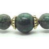 Women's bracelet in green natural turquoise beads and Tibetan beads