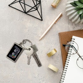 speecheese Video Game Controller Keyring - Gamer Accessory with Black Background Grey Buttons and a Colourful Cross-shaped Design for Gamers, Black, grey.