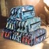 ColePack Design-Etui mit 3 Reißverschlüssen und Schulmaterial der ersten Marken