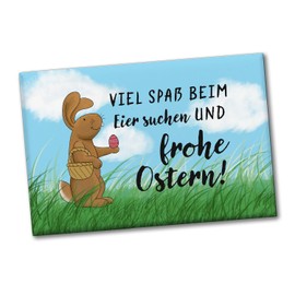 Search for eggs and happy Easter souvenir magnet with saying and Easter bunny as a beautiful decoration for Easter time for the fridge or pinning notes