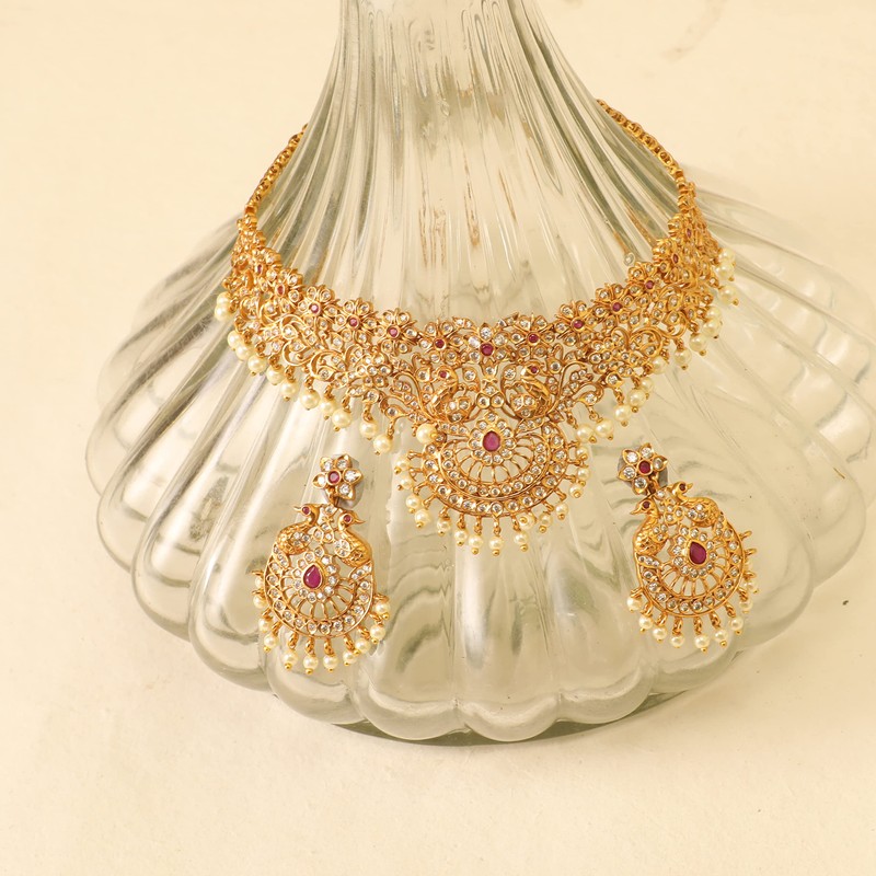 TARINIKA Antique Gold Plated Tania Choker Set with Peacock Design
