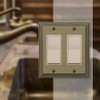 Amerelle 84RRRB Steps Cast Metal Double Rocker/GFCI Wallplate, Rustic Brass