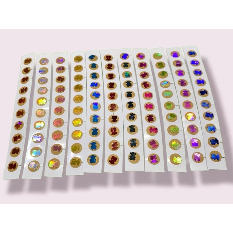 Productos comerciales Balines Con Parche Auriculoterapia 200 Piezas Con Figuras